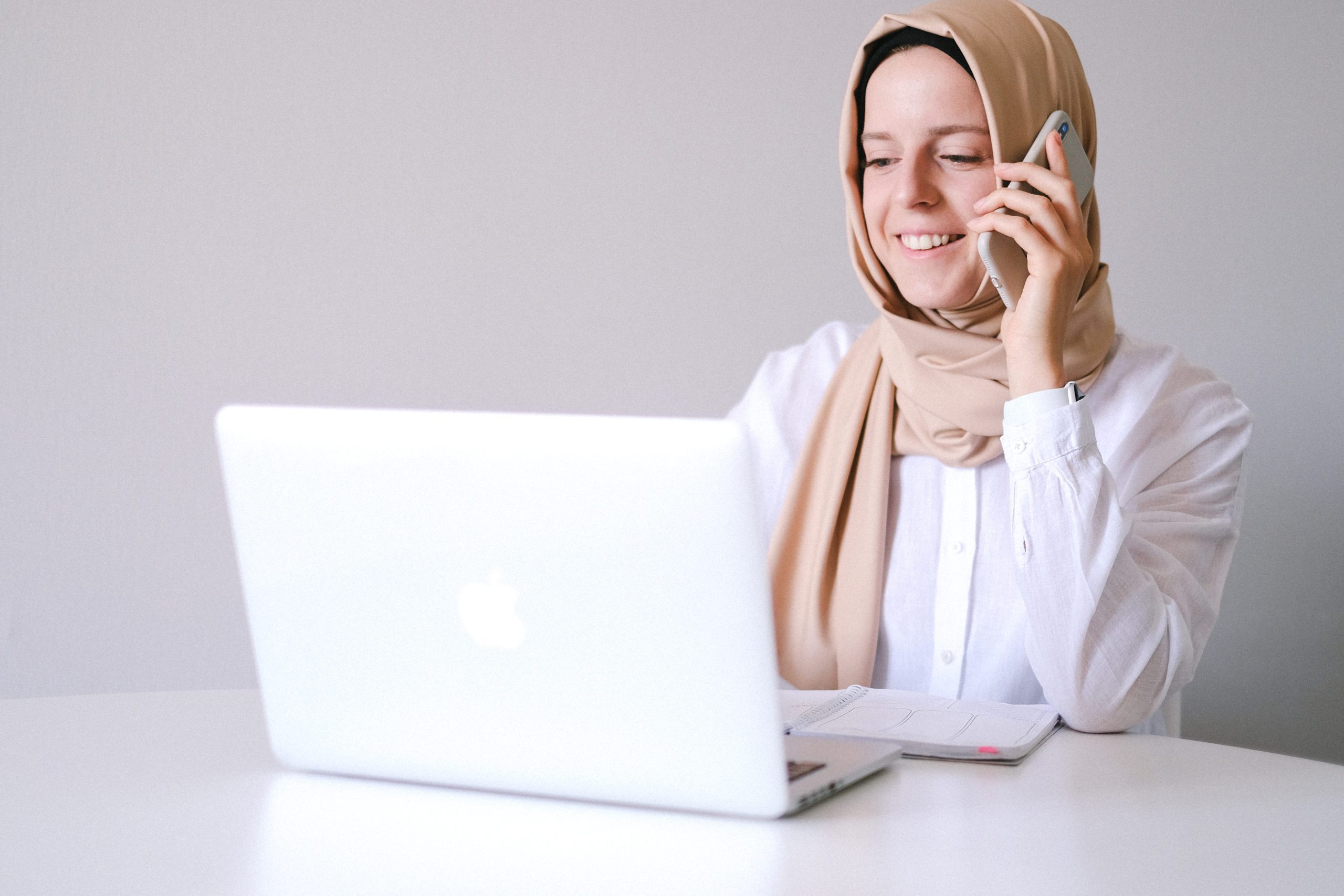 woman-in-white-hijab-using-macbook-4482885